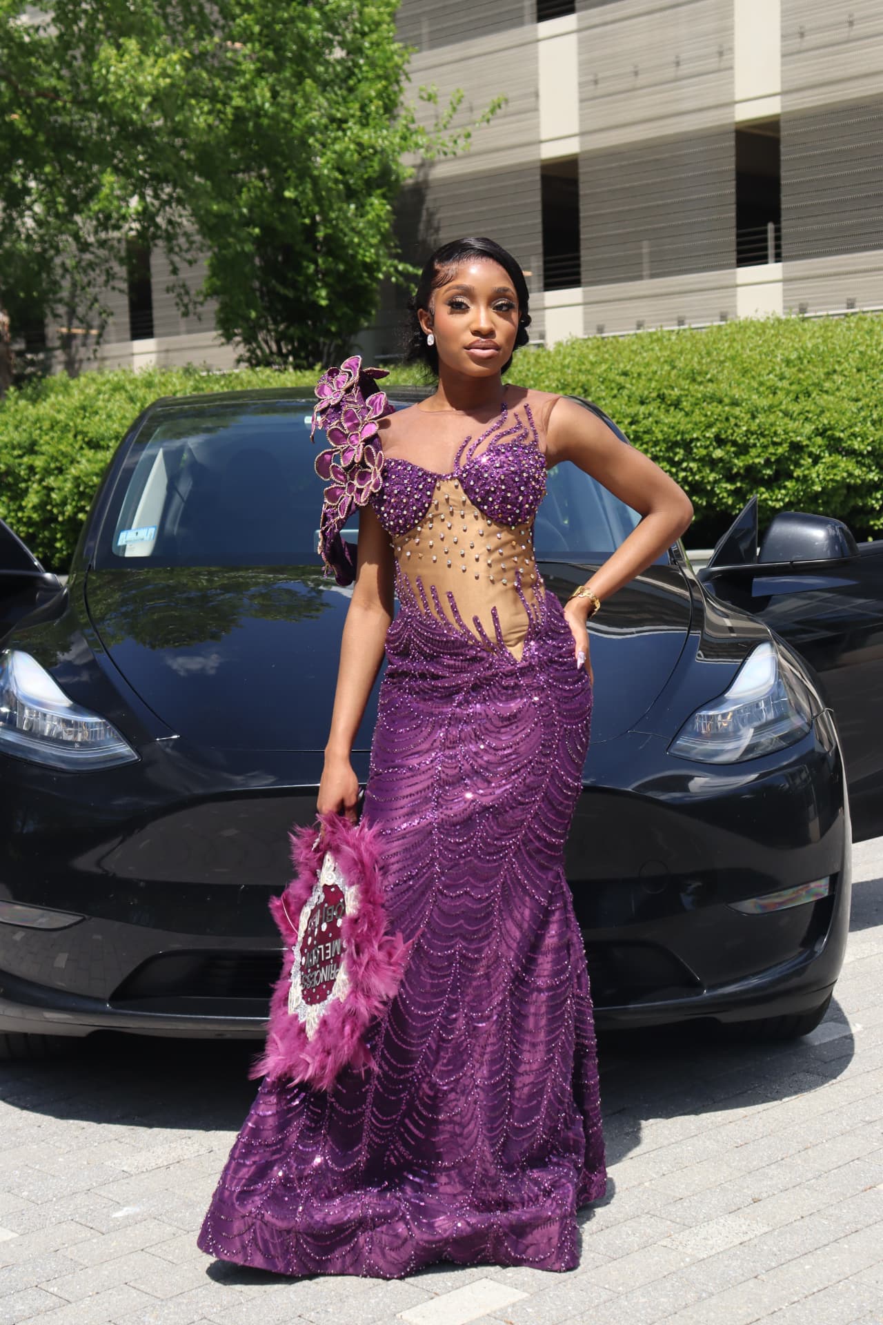 Prom send-off portrait in a purple gown